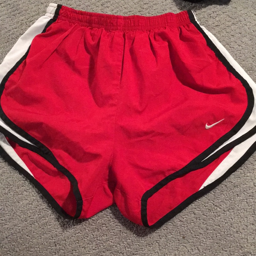 red nike shorts
